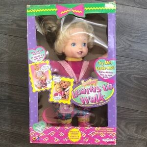 1998 DSI Toys Vintage Baby Learns To Walk Doll 16"
Blonde Hair And Blue Eyes